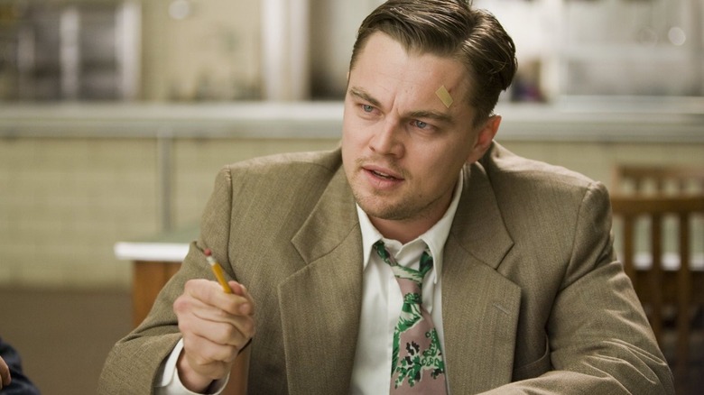 Leonardo DiCaprio lights a match