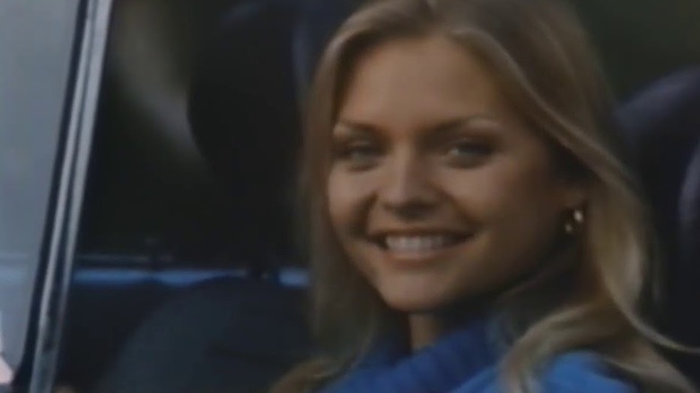 Michelle Pfeiffer smiles