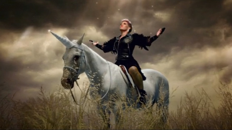 P!nk riding a unicorn