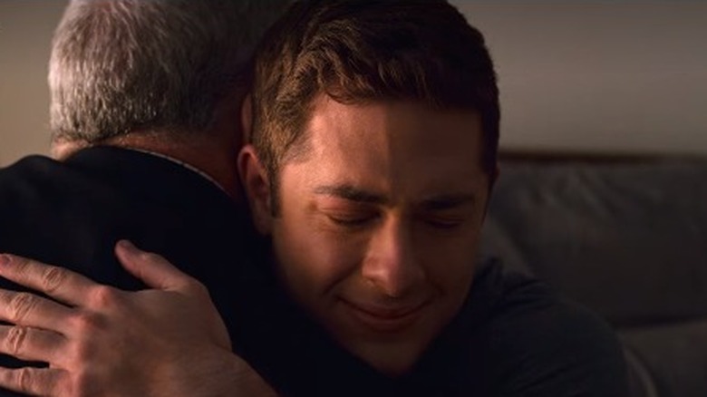 Ben and his dad hug