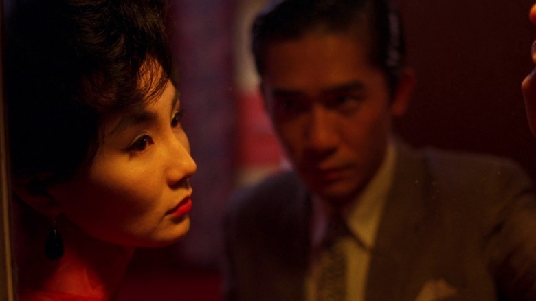 Tony Leung gazing at Maggie Cheung