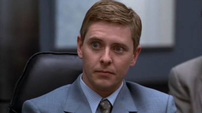 Dave Foley as Nelson Hibbert in The Wrong Guy