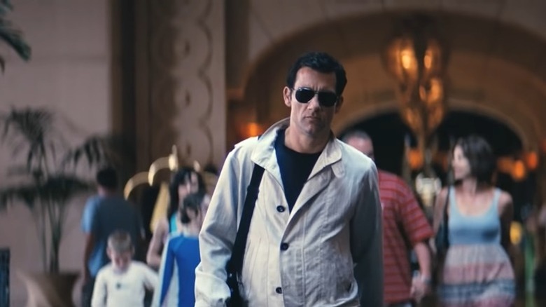 Duplicity's Clive Owen scowling in sunglasses