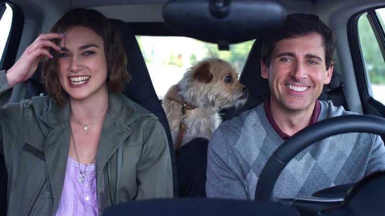 Penny, Dodge, and their dog driving