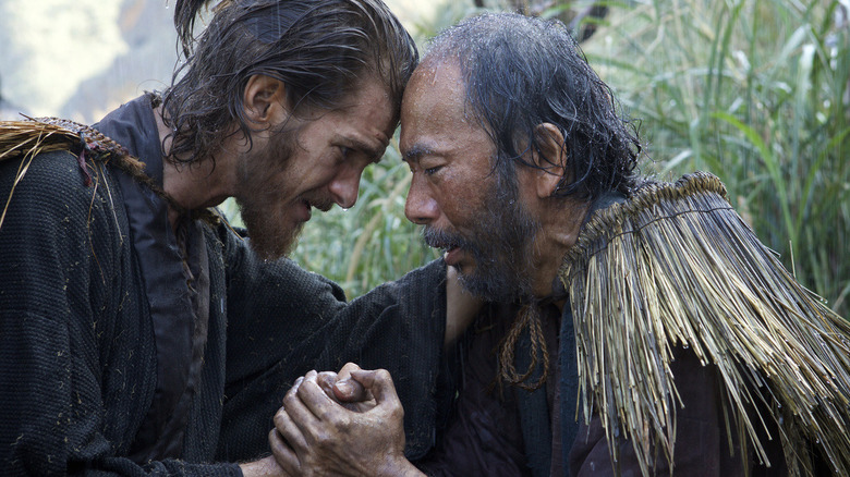 Andrew Garfield and Shinya Tsukamoto pray