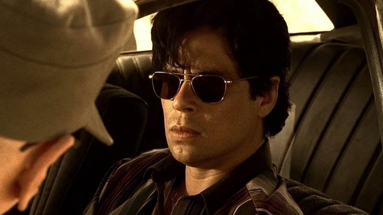 Javier Rodriguez questioned in his car in "Traffic" (2000)