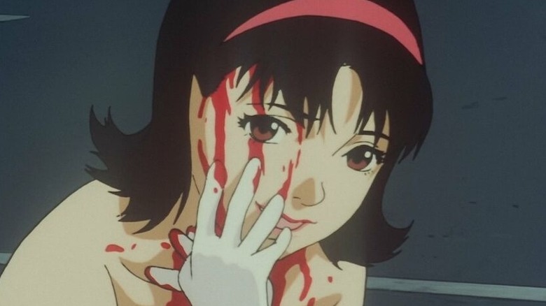 Ruby smiling, covered in blood