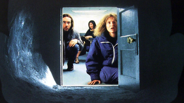 John Cusack and Cameron Diaz and the secret door in Being John Malkovich