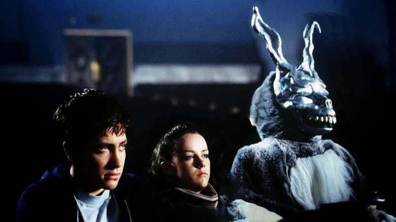 Jake Gyllenhaal as Donnie Darko with demonic rabbit Frank