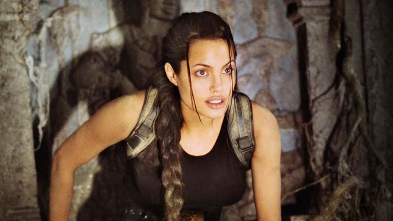 Lara Croft being caught while raiding a tomb