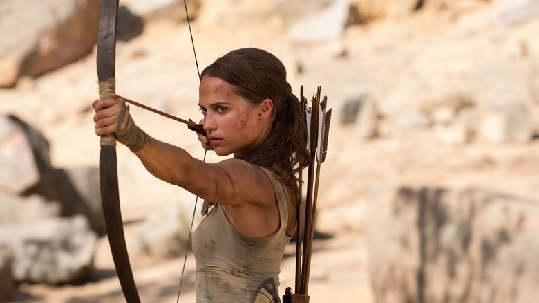 Lara Croft pulling back her bow