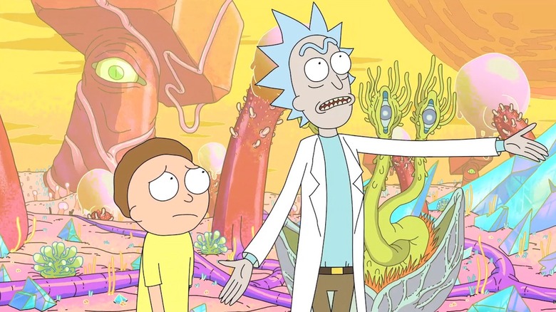 Rick and Morty walking along an alien landscape in the series pilot