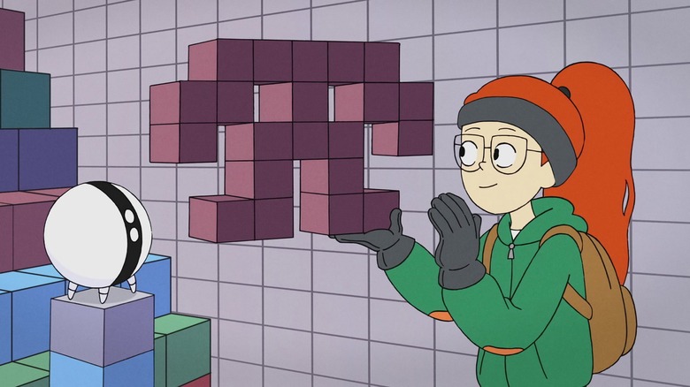 Tulip holds a blocky object