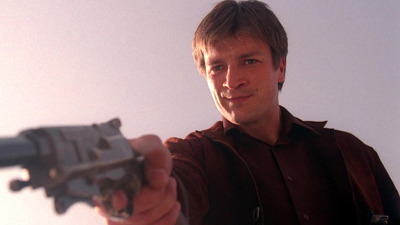 Nathan Fillion aiming