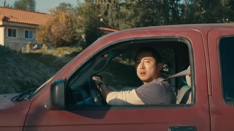 Beef's Danny Cho sitting in his truck looking concerned