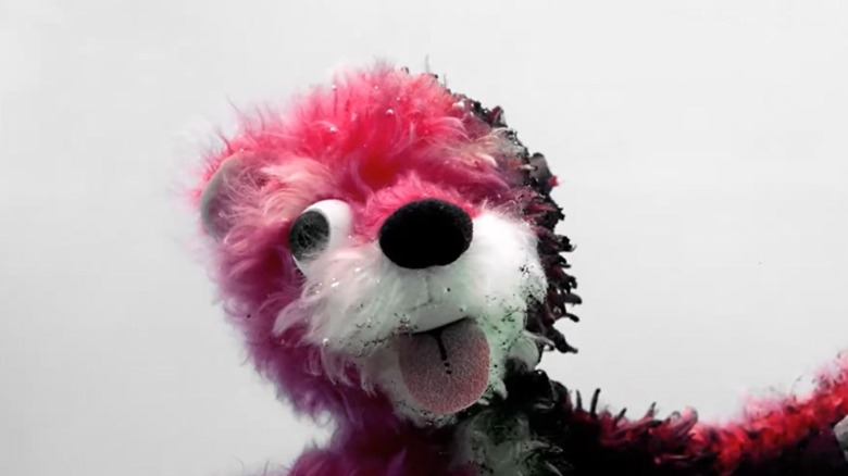 A damaged pink bear