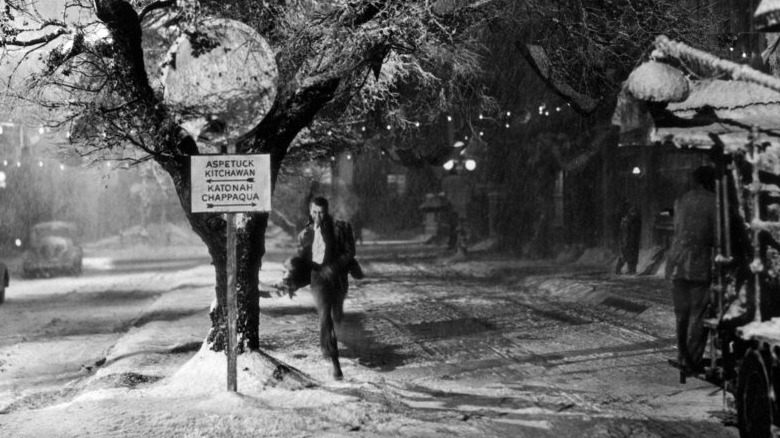 Jimmy Stewart runs in snow