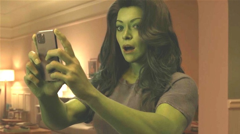 She-Hulk holds up her phone