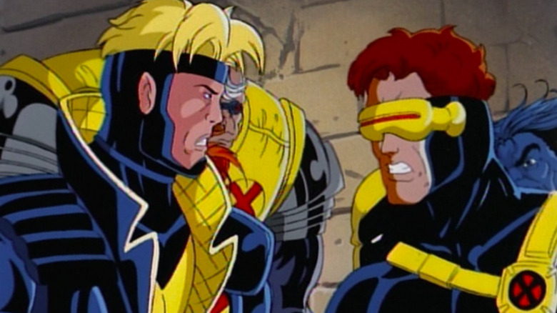 Cyclops and Havok gritting their teeth while Strong Guy, Wolverine and Beast stand behind them