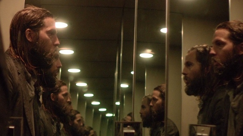 Logan Marshall-Green looks in mirror with endless reflections