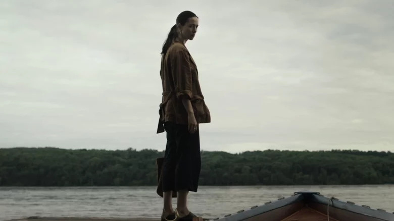 Rebecca Hall looks at boat