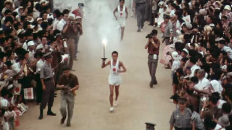 Olympian carrying the torch