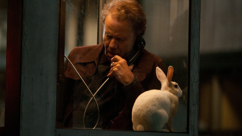 Tom Waits with a white bunny rabbit 