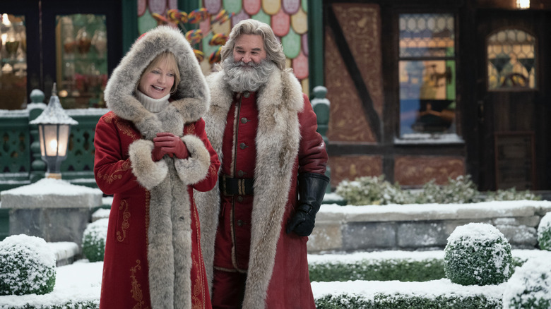 Santa and Mrs. Clause in the beautiful coats