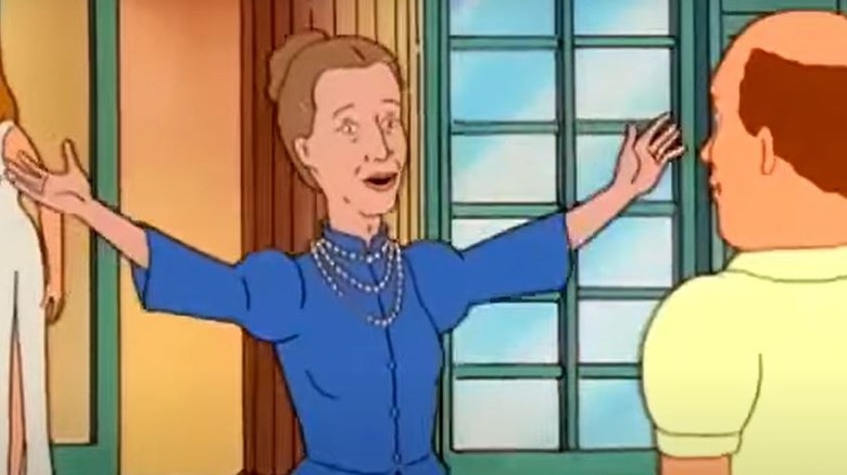 Aunt Esme hugging Bill Dauterive