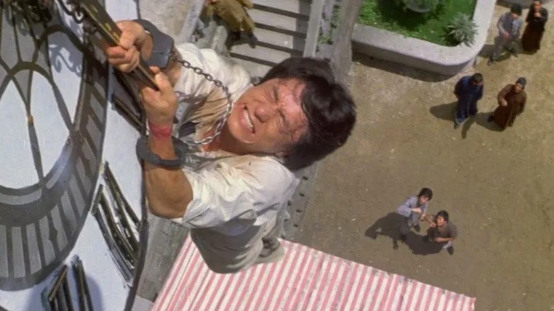 Jackie Chan hanging from clock tower