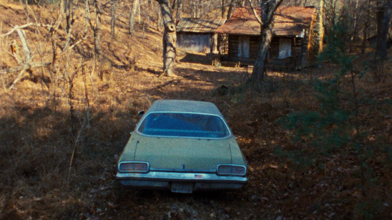 Car outside Evil Dead cabin