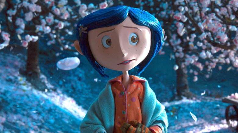 Coraline walks through trees