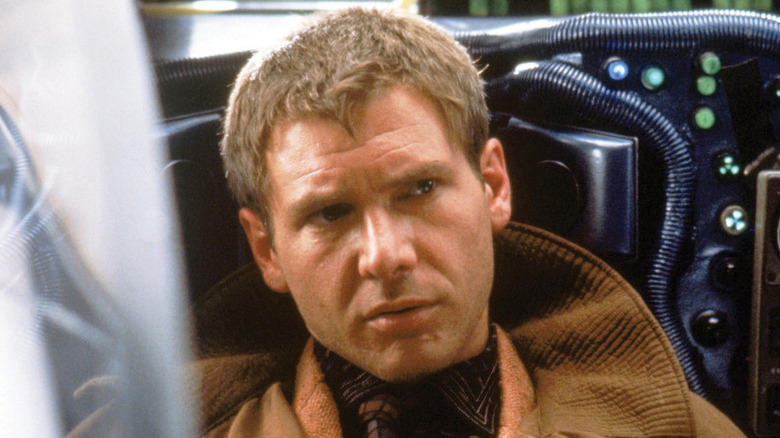 Rick Deckard wearing brown coat