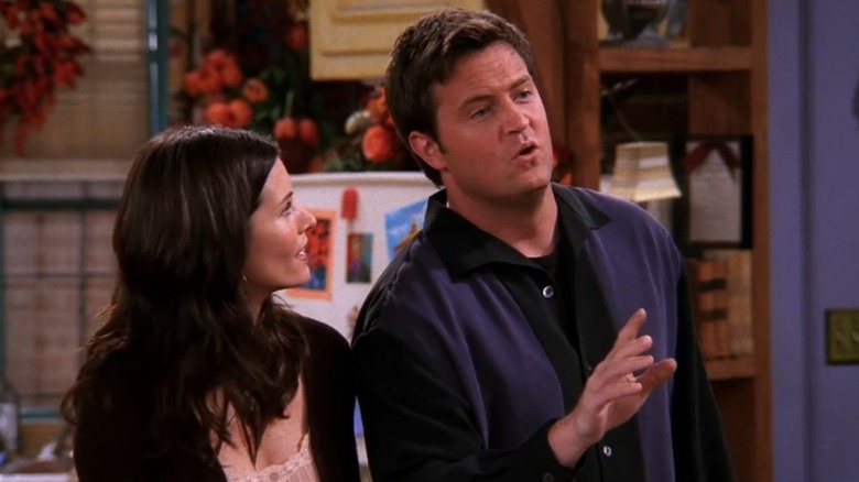 Monica looking at Chandler