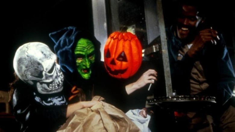 Trick or treaters wearing masks