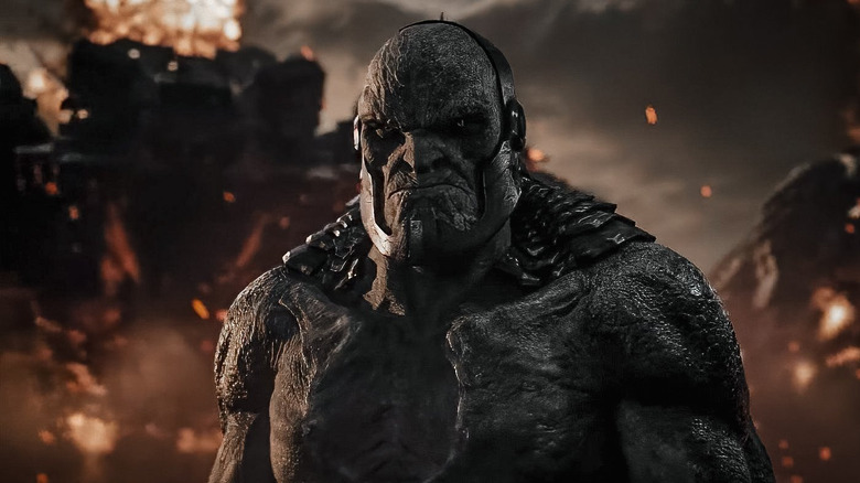 Darkseid looming over a battlefield