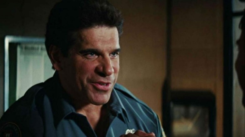 Lou Ferrigno talking wearing uniform