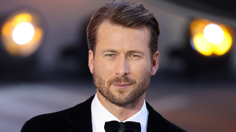 Glen Powell wearing a tuxedo