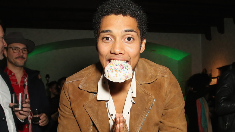 Chance Perdomo with donut in mouth