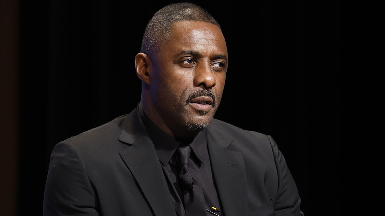 Idris Elba in black suit