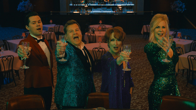 Trent, Barry, Dee Dee, and Angie raising a glass