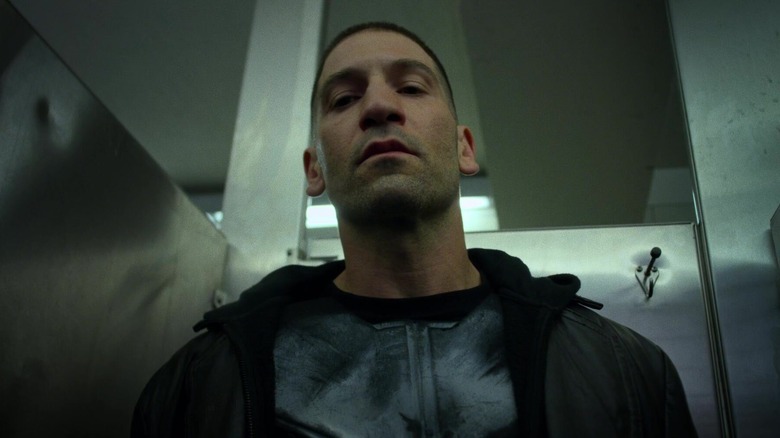 Frank Castle stands in bathroom