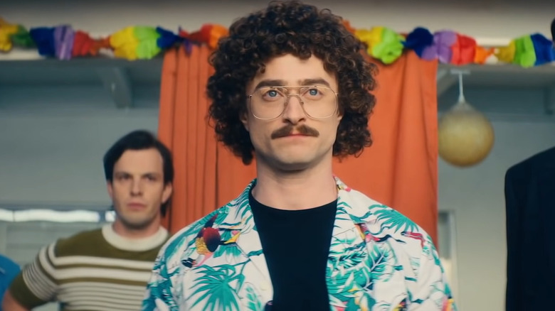 Daniel Radcliffe as Weird Al looking serious at pool party