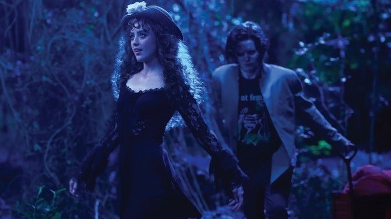 The Creature follows Lisa through the woods in "Lisa Frankenstein" (2024)