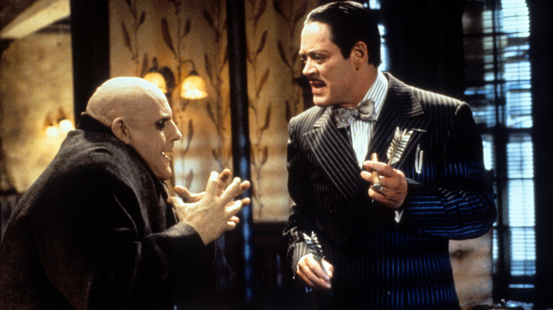 Uncle Fester talks to Gomez in "The Addams Family" (1991)