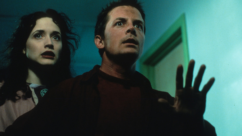 Lucy and Frank look nervous in "The Frighteners" (1996)