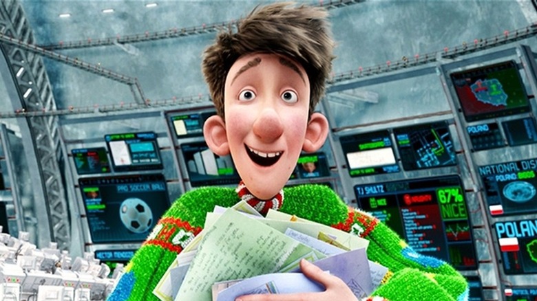 Arthur Christmas holding letters