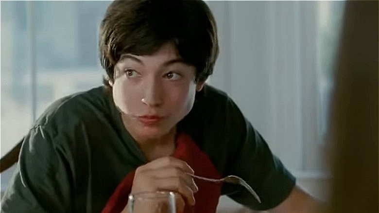 Ezra Miller eating a meal