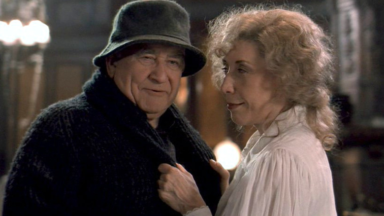 Ed Asner and Lily Tomlin smiling