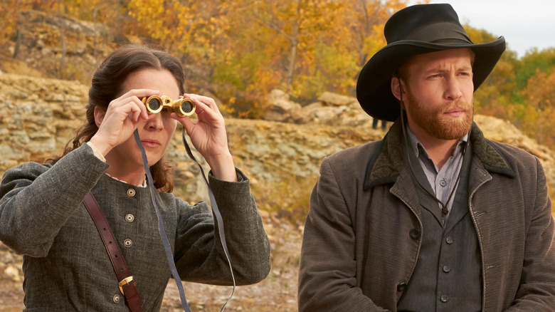 Pinkerton and Warne watch a suspect from a ridgeline